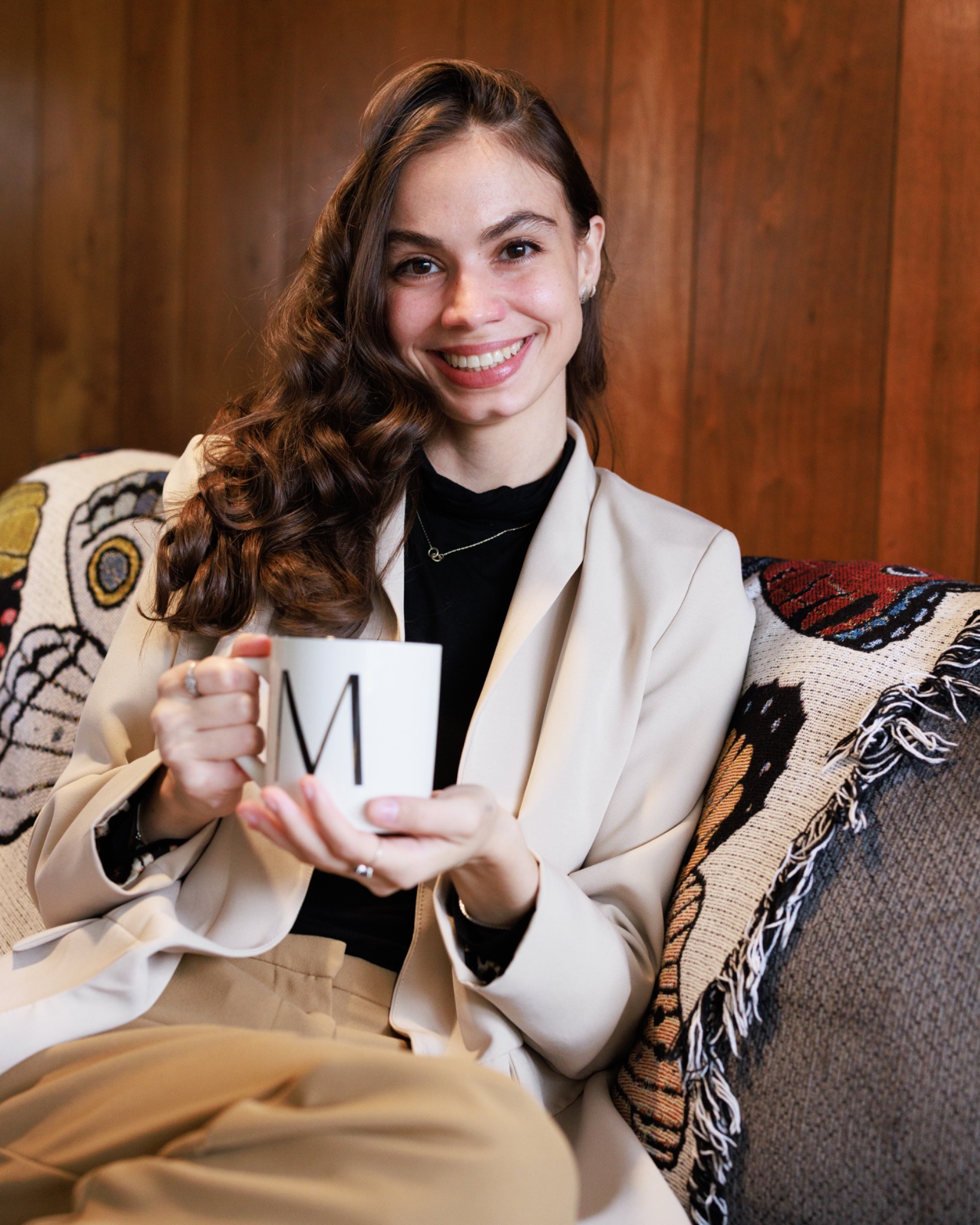 Photo of MAR holding a mug